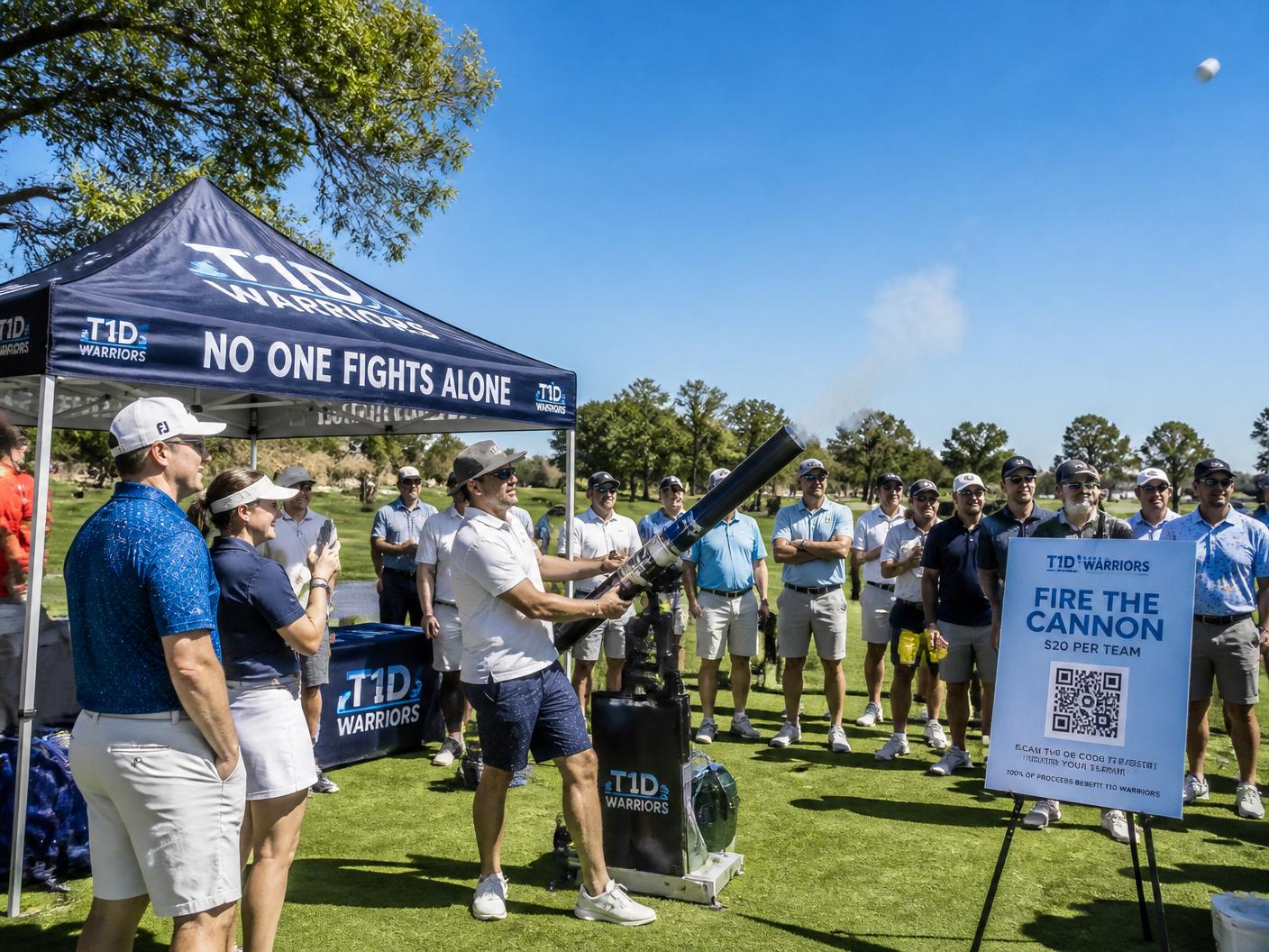 T1D Warriors crew running the golf ball cannon under the branded tent at a charity outing
